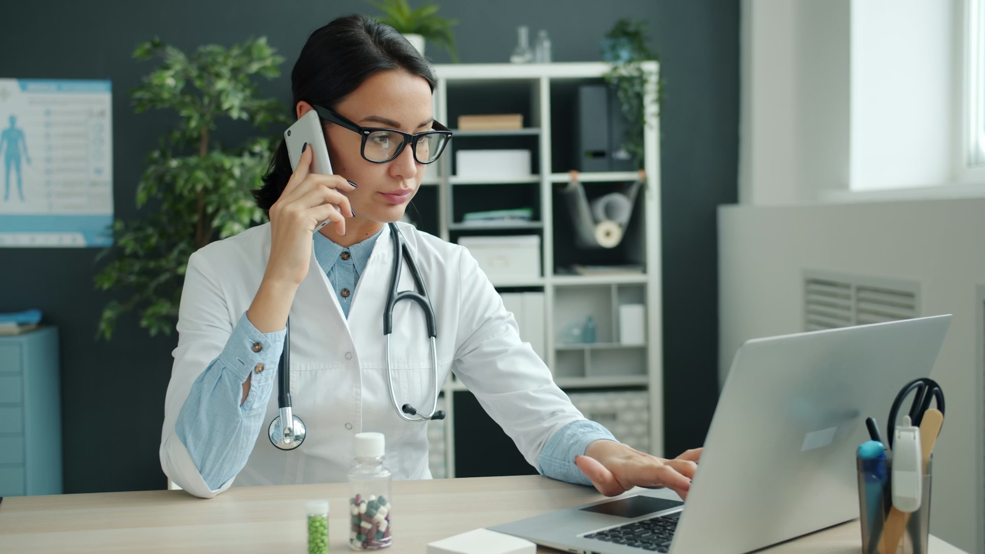 Smiling female doctor on a video call.